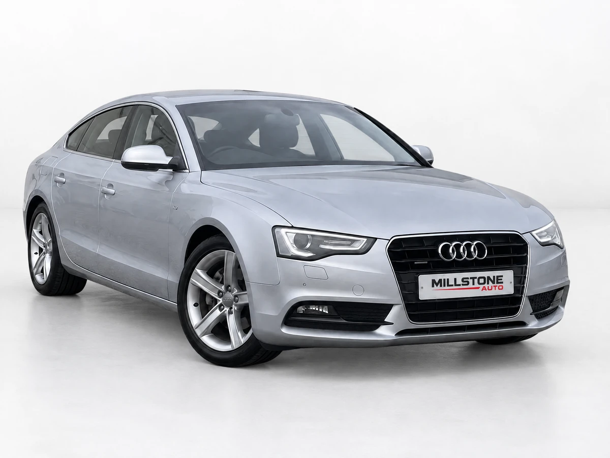 The same silver Audi A5 Sportback in a white marketplace studio with a Millstone Auto branded dealer plate