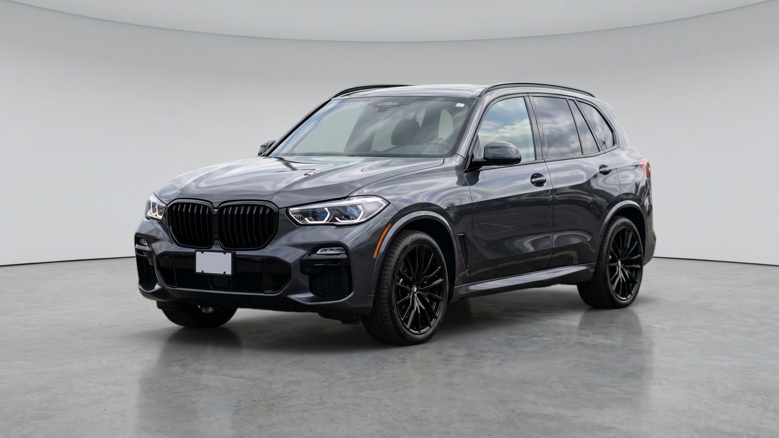 Dark graphite SUV processed with the CarPixAI Clean Dealer Studio background